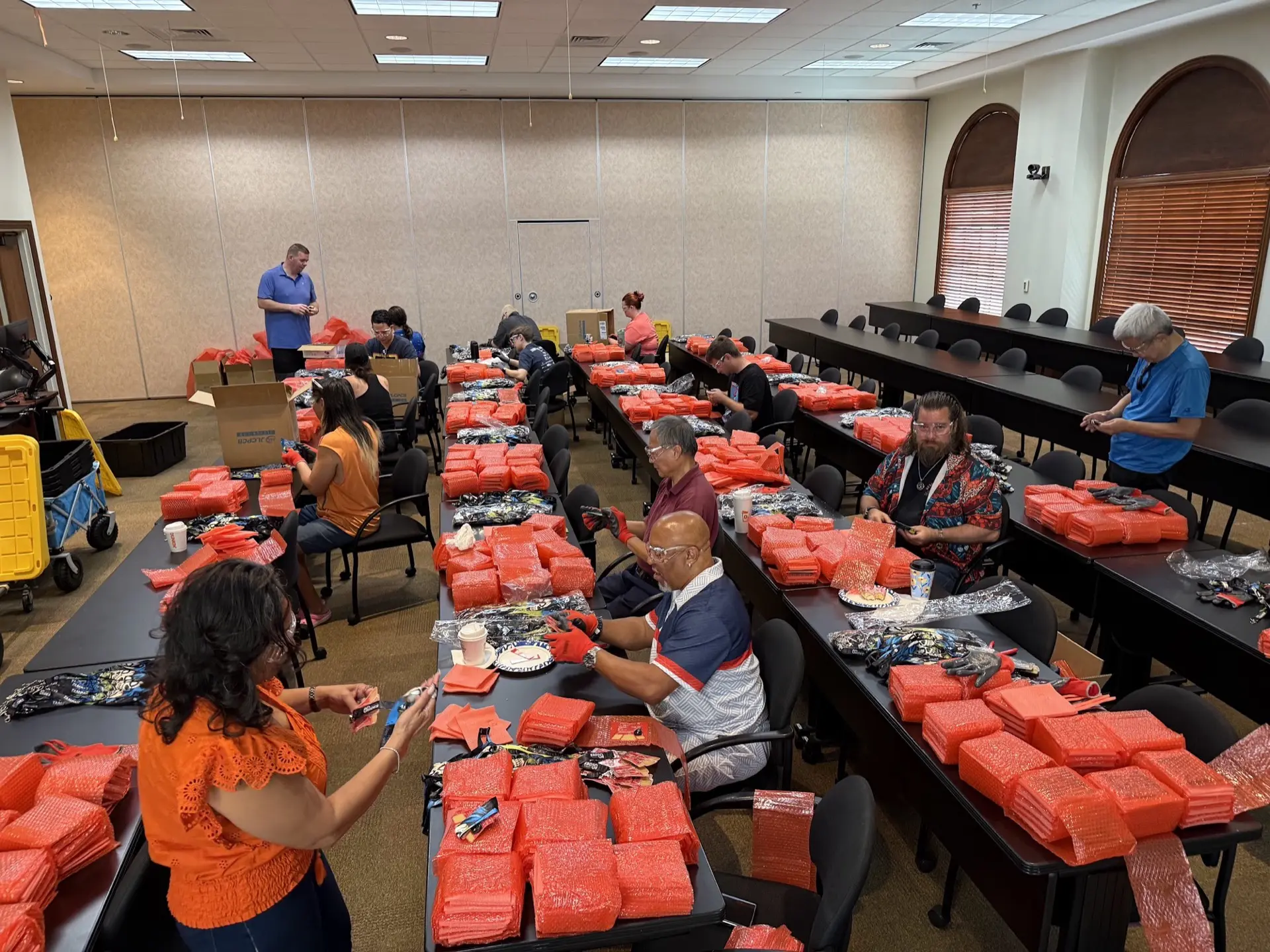 Krewe members assembling conference materials