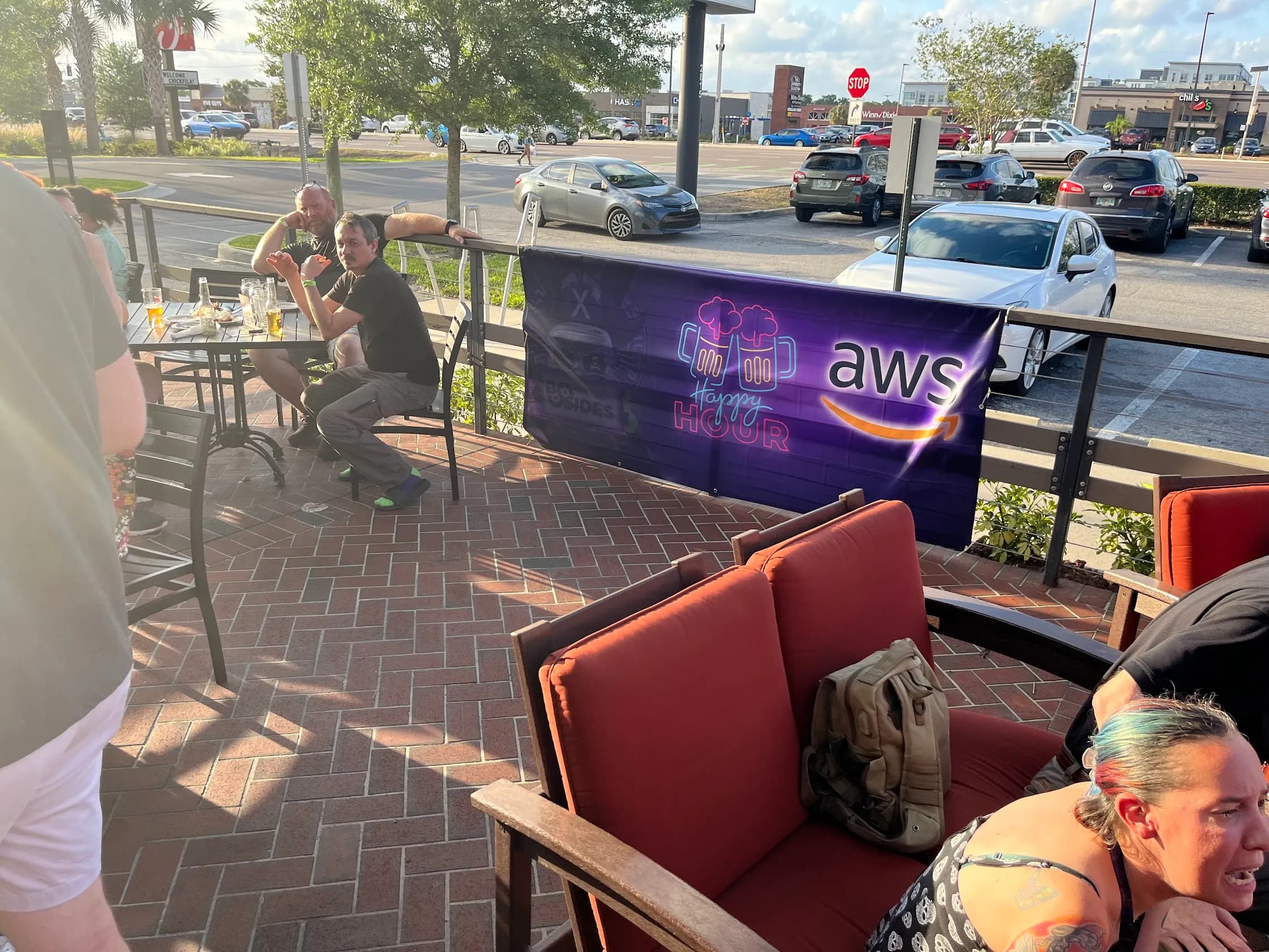 Participants networking at BSides Tampa Happy Hour