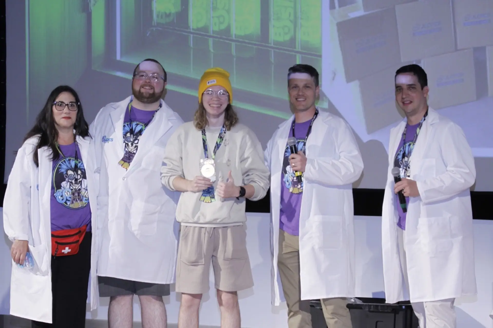 2025 badge challenge winner receiving their prize on stage