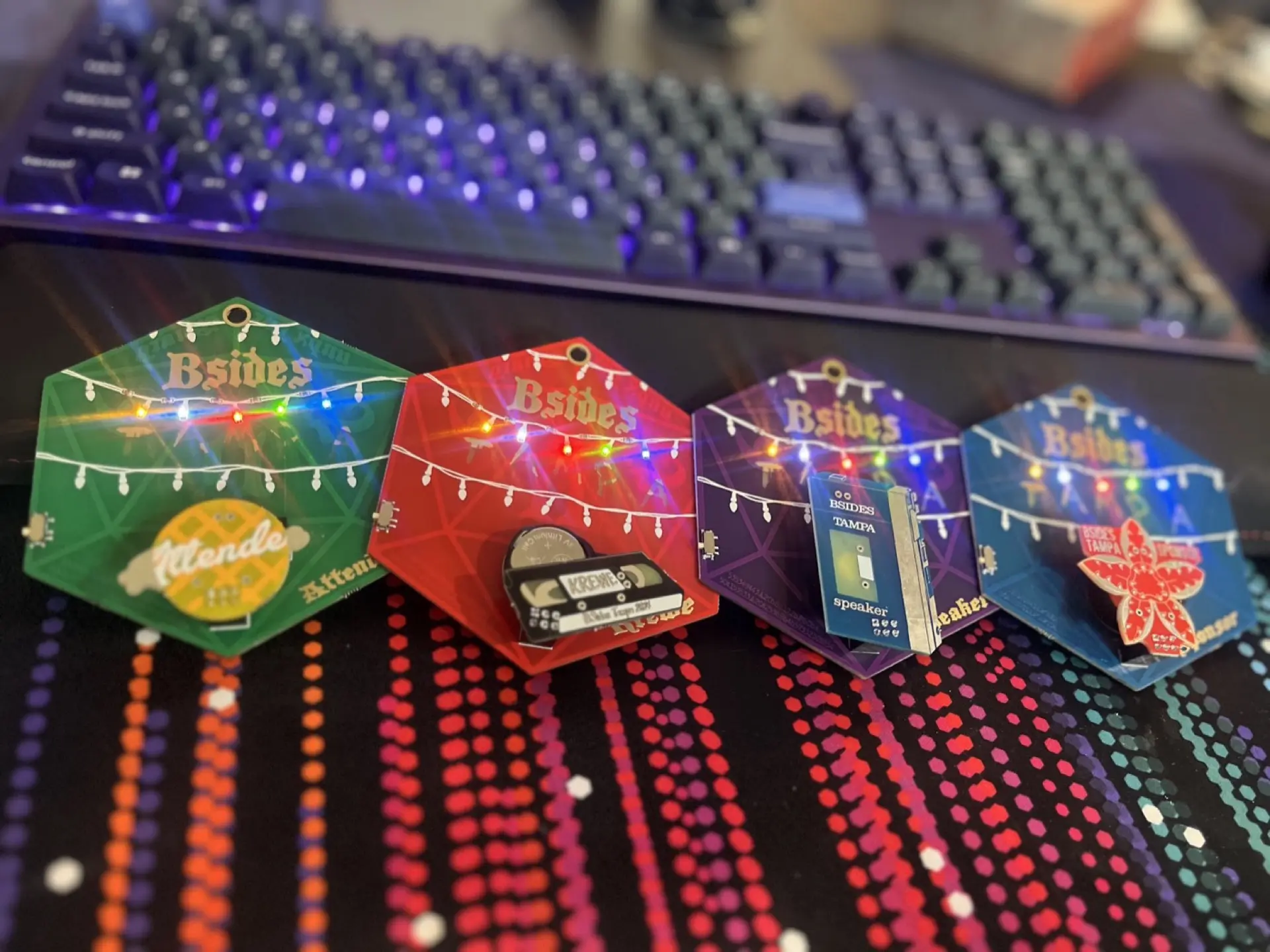 BSides Tampa 2023 hexagonal badges with LED Christmas lights
