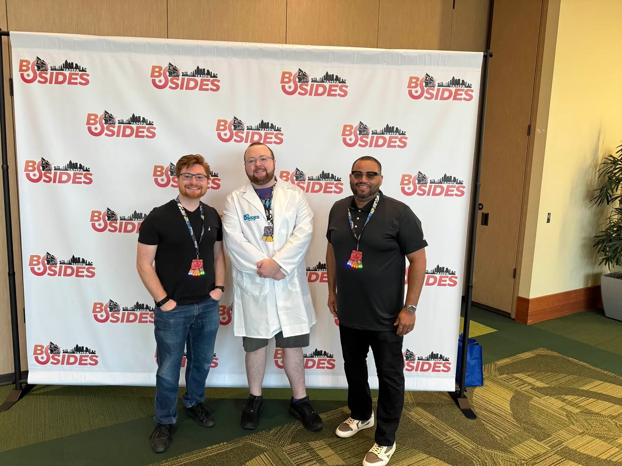 Krewe members at the BSides Tampa photo backdrop