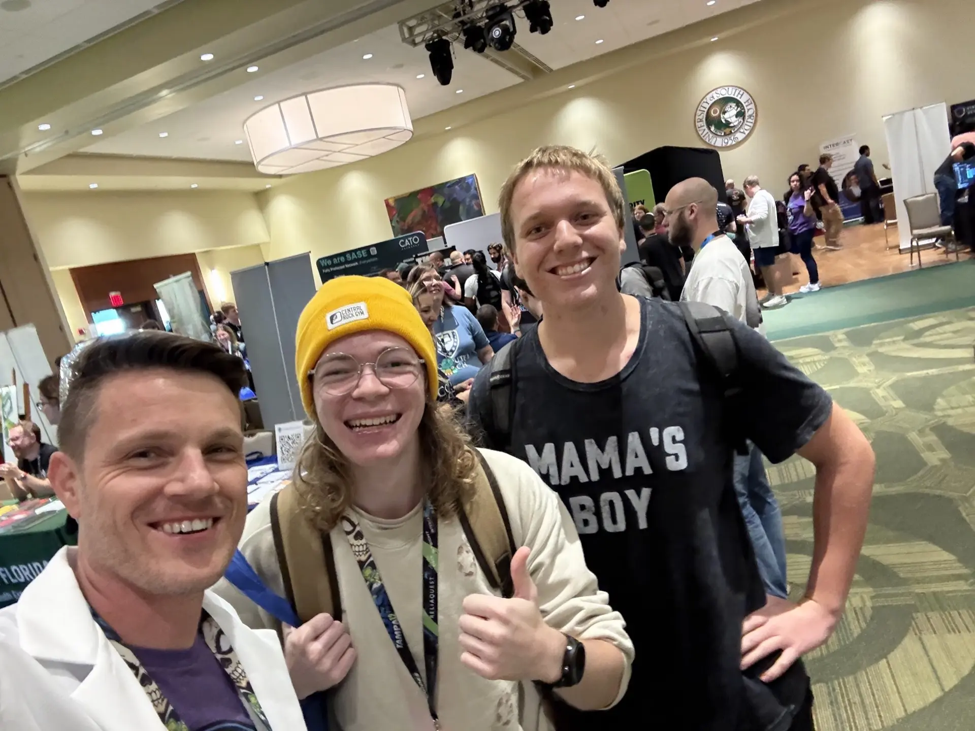 Participants on the expo floor between sessions